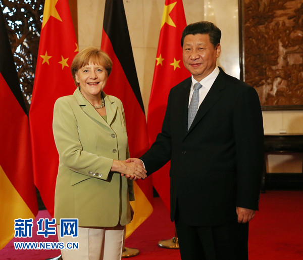 7月7日,国家主席习近平在北京钓鱼台国宾馆会见德国总理默克尔。新华社记者 刘卫兵 摄