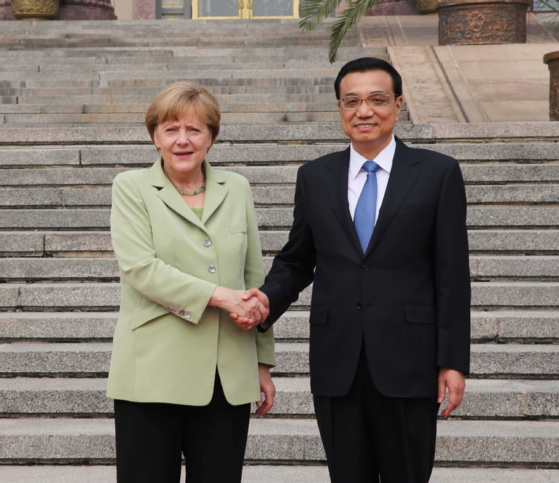 7月7日,中国国务院总理李克强在北京人民大会堂同德国总理默克尔举行会谈。新华社记者 刘卫兵 摄