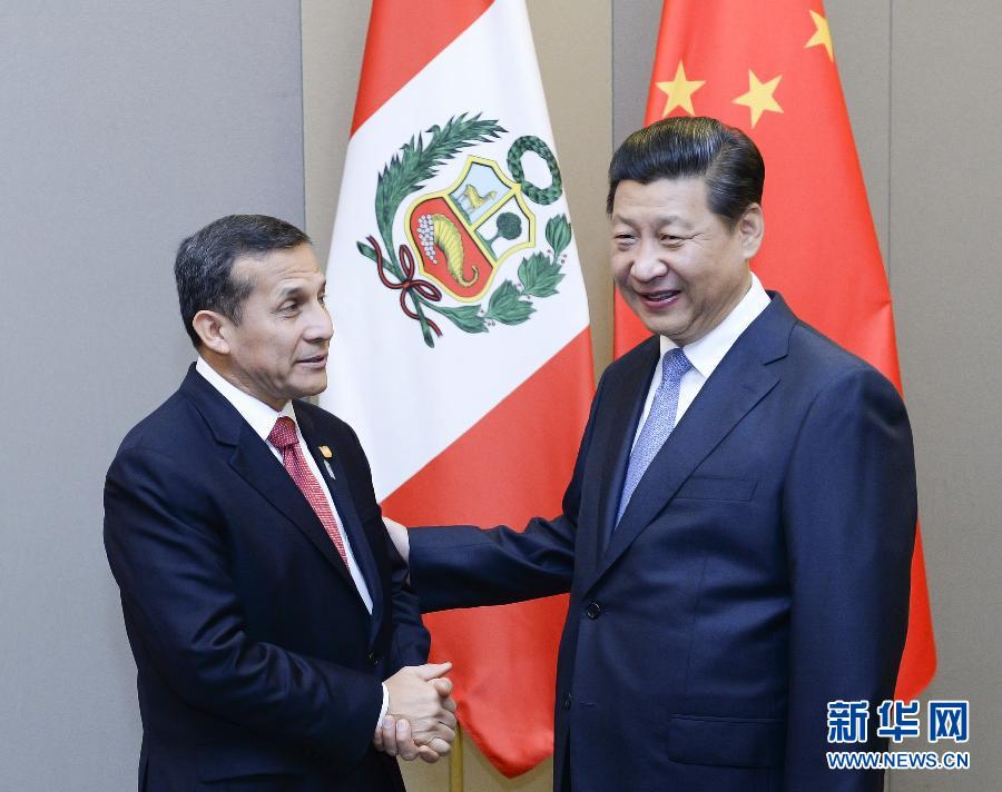 7月16日,国家主席习近平在巴西首都巴西利亚会见秘鲁总统乌马拉。新华社记者 刘建生 摄