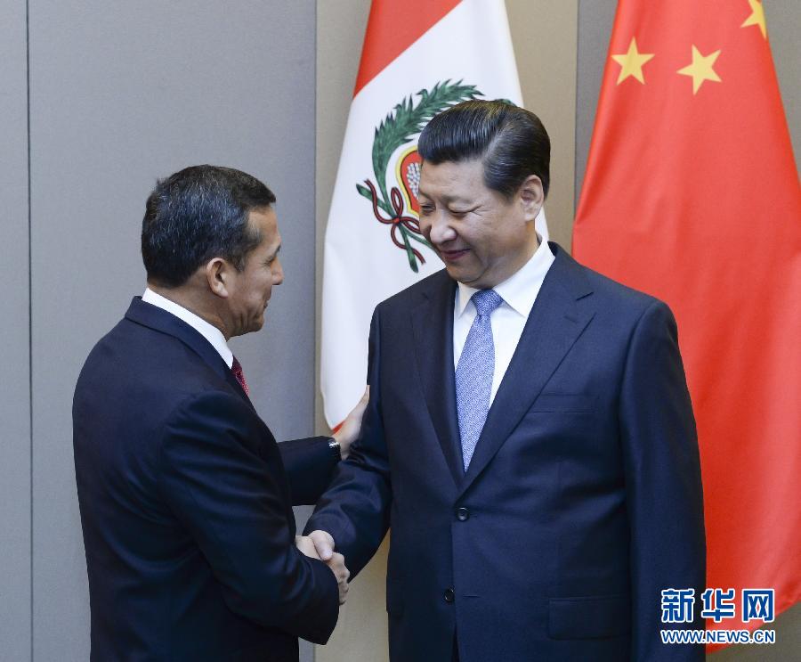 7月16日,国家主席习近平在巴西首都巴西利亚会见秘鲁总统乌马拉。新华社记者 刘建生 摄