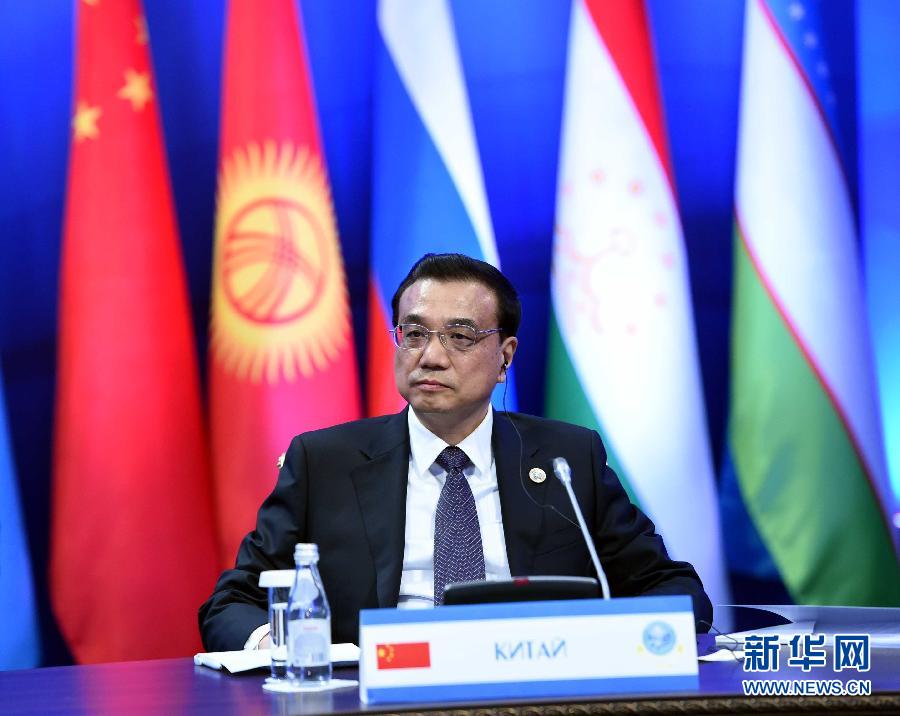 12月15日,中国国务院总理李克强在阿斯塔纳出席上海合作组织成员国政府首脑理事会第十三次会议。 新华社记者 饶爱民 摄