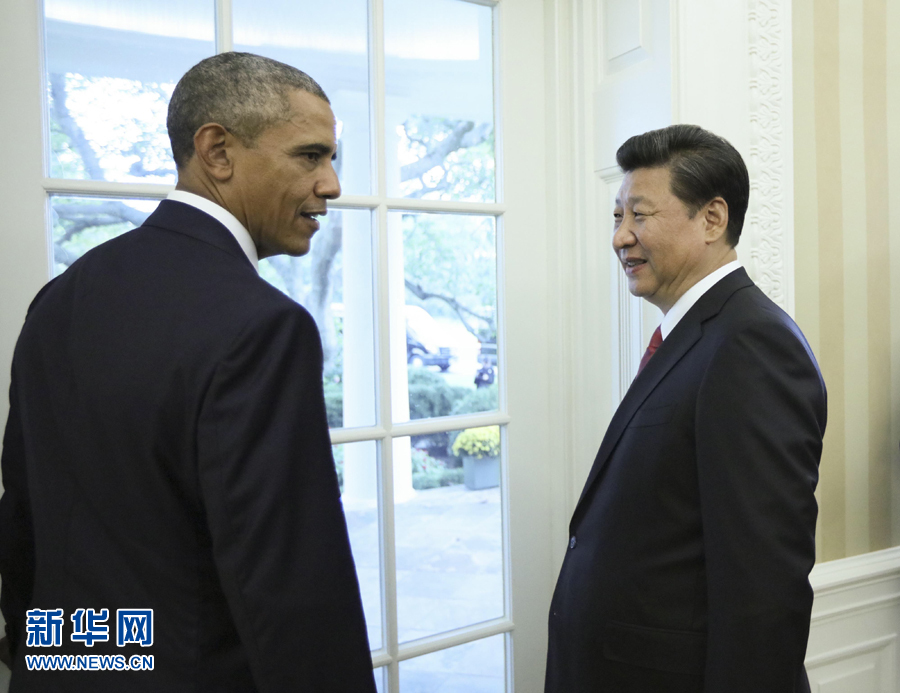 9月25日,国家主席习近平在华盛顿同美国总统奥巴马举行会谈。这是会谈结束后,习近平同奥巴马准备共同会见记者。 新华社记者兰红光摄
